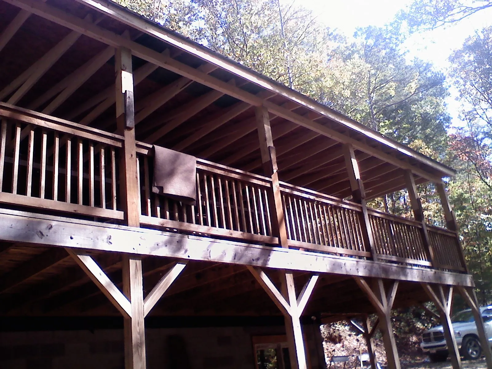 Timber framing under a new elevated porch and deck — Roof Leak Repair in Hay by Roofing Brothers